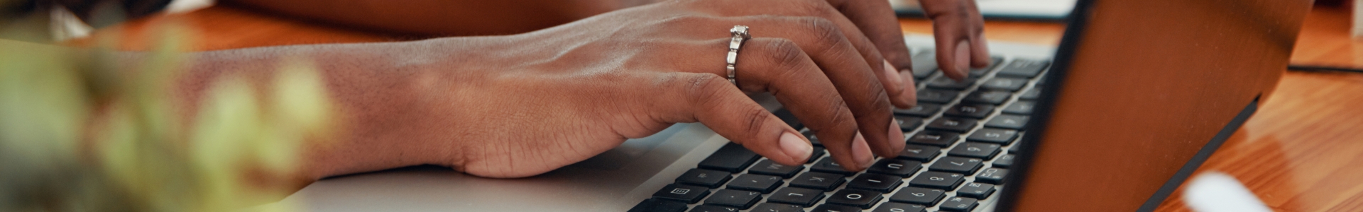 typing on laptop