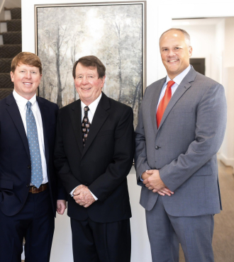 Greenhalgh Insurance Agency’s commercial lines producers Garrett Brasher, left, Adam Greenhalgh, Russell Greenhalgh and Walter Crye.